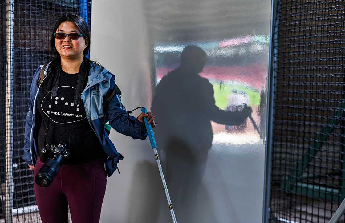 Tina Zhu Xi Caruso poses at an event Tina Zhu Xi Caruso poses at an event