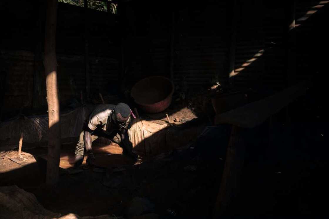 Gold particles are extracted through a laborious process of 'cleaning' the soil Gold particles are extracted through a laborious process of 'cleaning' the soil