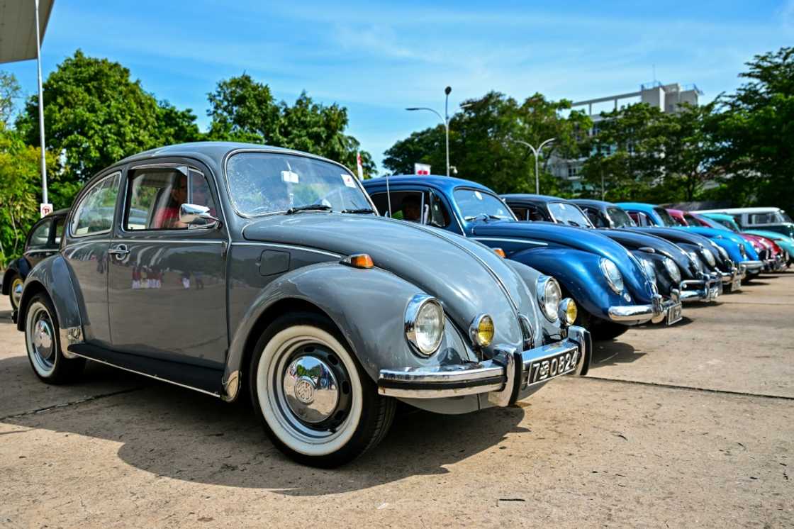 Vintage Volkswagen Beetle cars. The European auto industry has reacted to an US-EU tariff deal with relief and concern Vintage Volkswagen Beetle cars. The European auto industry has reacted to an US-EU tariff deal with relief and concern