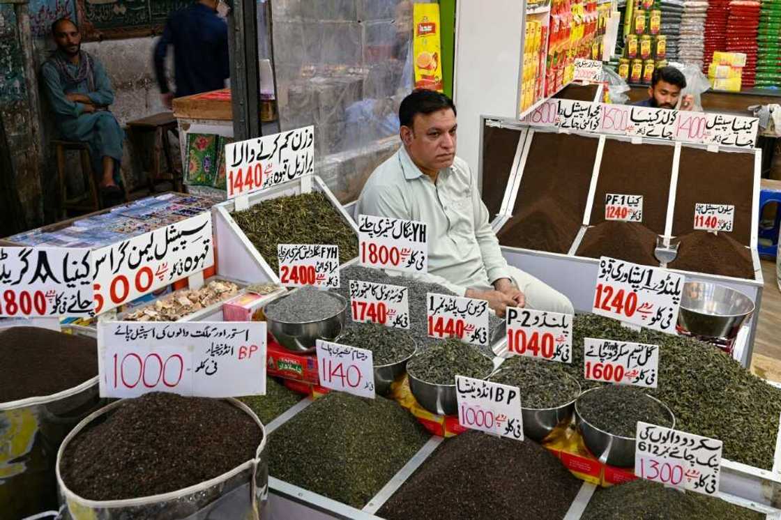 A tea seller waits for customers at his market shop in Rawalpindi. Year-on-year inflation hit 37.97 percent in May, according to latest data A tea seller waits for customers at his market shop in Rawalpindi. Year-on-year inflation hit 37.97 percent in May, according to latest data