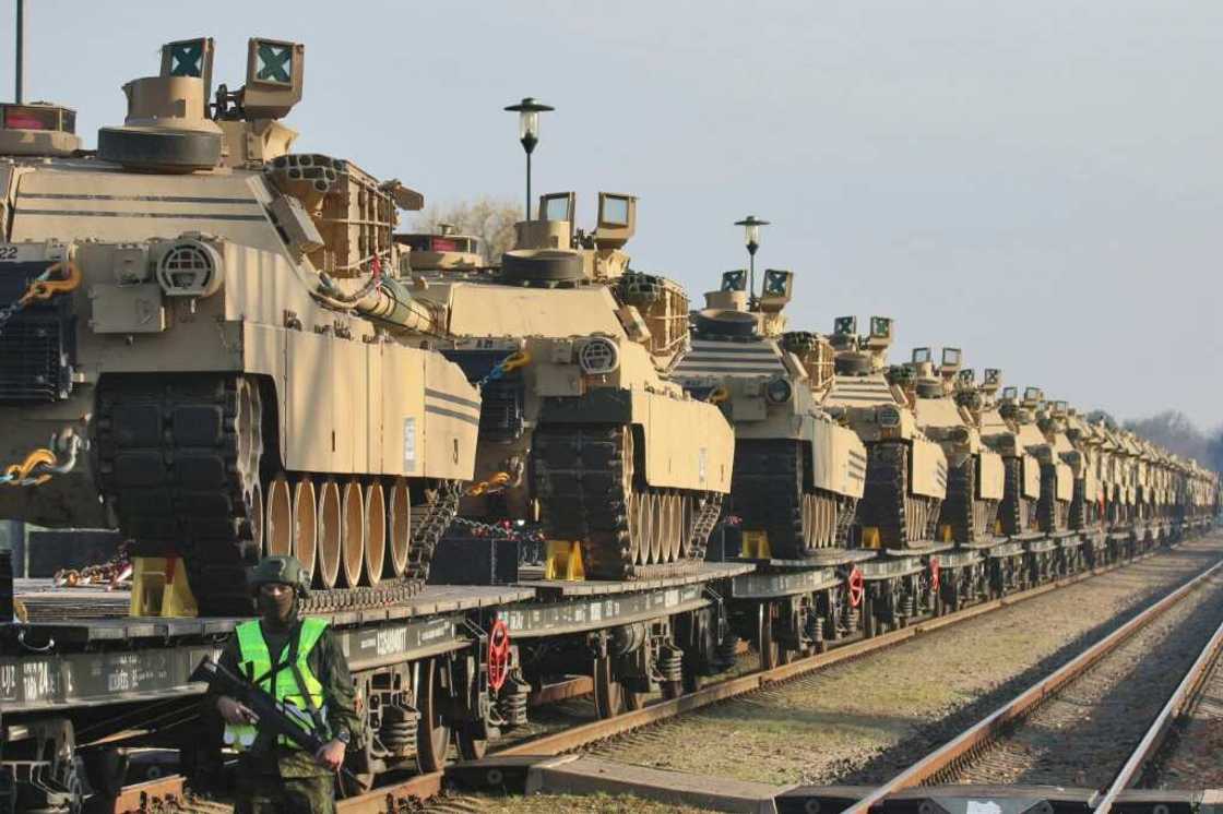 Abrams tanks are seen at the railway station near the Pabrade military base in Lithuania on October 21, 2019 as the United States began deploying a battalion Abrams tanks are seen at the railway station near the Pabrade military base in Lithuania on October 21, 2019 as the United States began deploying a battalion