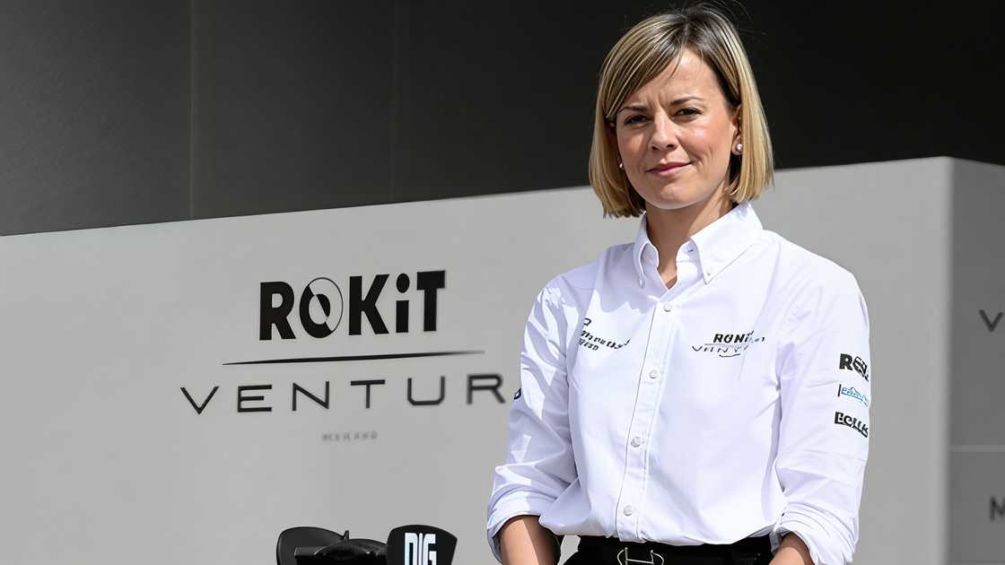 Susie Wolff poses standing. Susie Wolff poses standing.