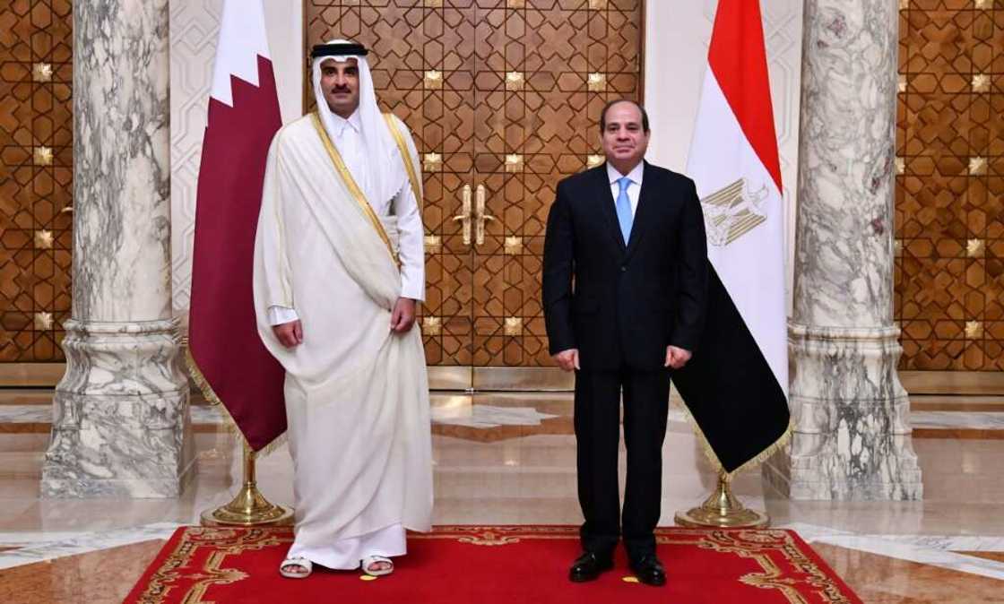Egyptian President Abdel Fattah al-Sisi (R) receives the Emir of Qatar Sheikh Tamim bin Hamad Al-Thani at the presidential palace in the capital Cairo on June 25 Egyptian President Abdel Fattah al-Sisi (R) receives the Emir of Qatar Sheikh Tamim bin Hamad Al-Thani at the presidential palace in the capital Cairo on June 25