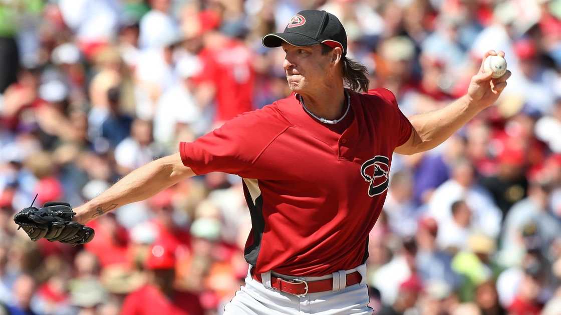 Randy Johnson pitches during a game. Randy Johnson pitches during a game.