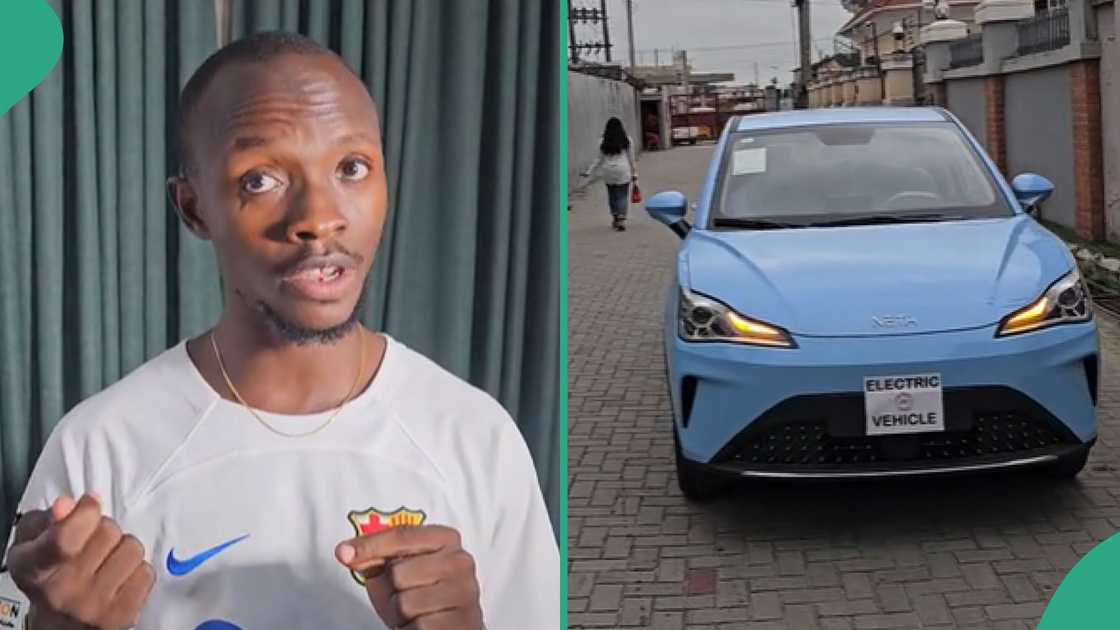Man shows off Neta electric vehicle. Man shows off Neta electric vehicle.