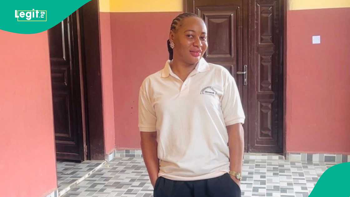 Photo as Nigerian lady shows netizens her solar generator which powers her TV, laptop and other things at home