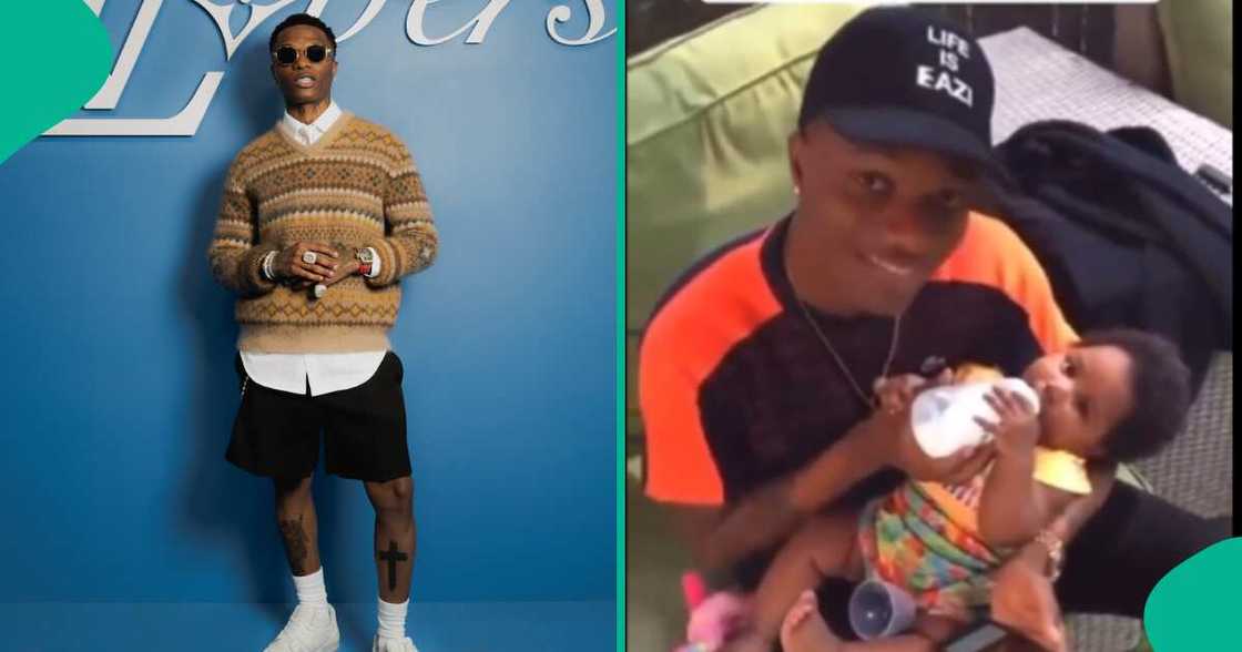 Video of Wizkid bottle feeding his son, AJ goes viral Video of Wizkid bottle feeding his son, AJ goes viral