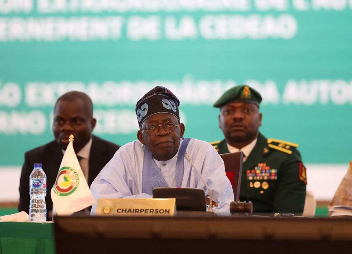 President of Nigeria, Bola Ahmed Tinubu, reacts while addressing the ECOWAS head of states and government in Abuja President of Nigeria, Bola Ahmed Tinubu, reacts while addressing the ECOWAS head of states and government in Abuja