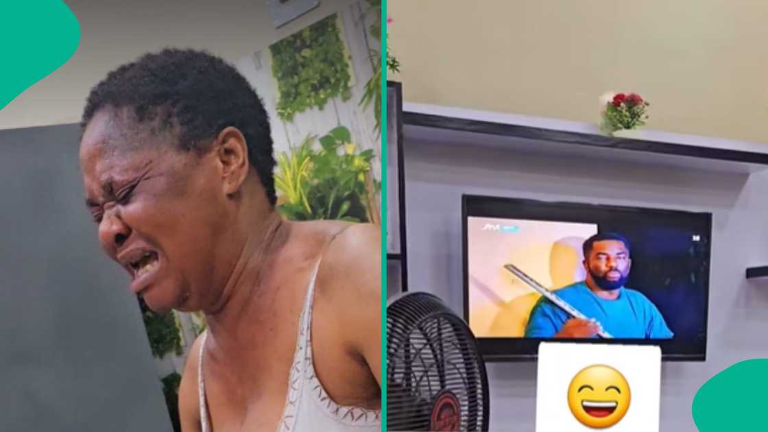 Nigerian woman becomes emotional while watching a movie.