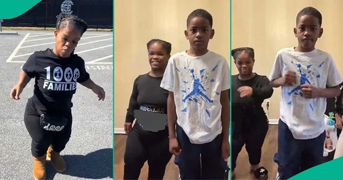 Pretty mum with dwarfism dances happily with her tall son Pretty mum with dwarfism dances happily with her tall son