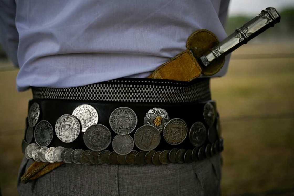 Gauchos wear a dagger they call a 'facon' Gauchos wear a dagger they call a 'facon'