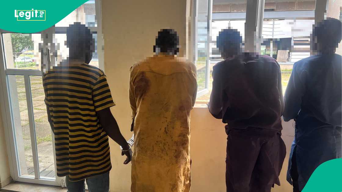Police officers in Oyo state parade four suspected kidnappers following the rescue of abducted children during a security operation.