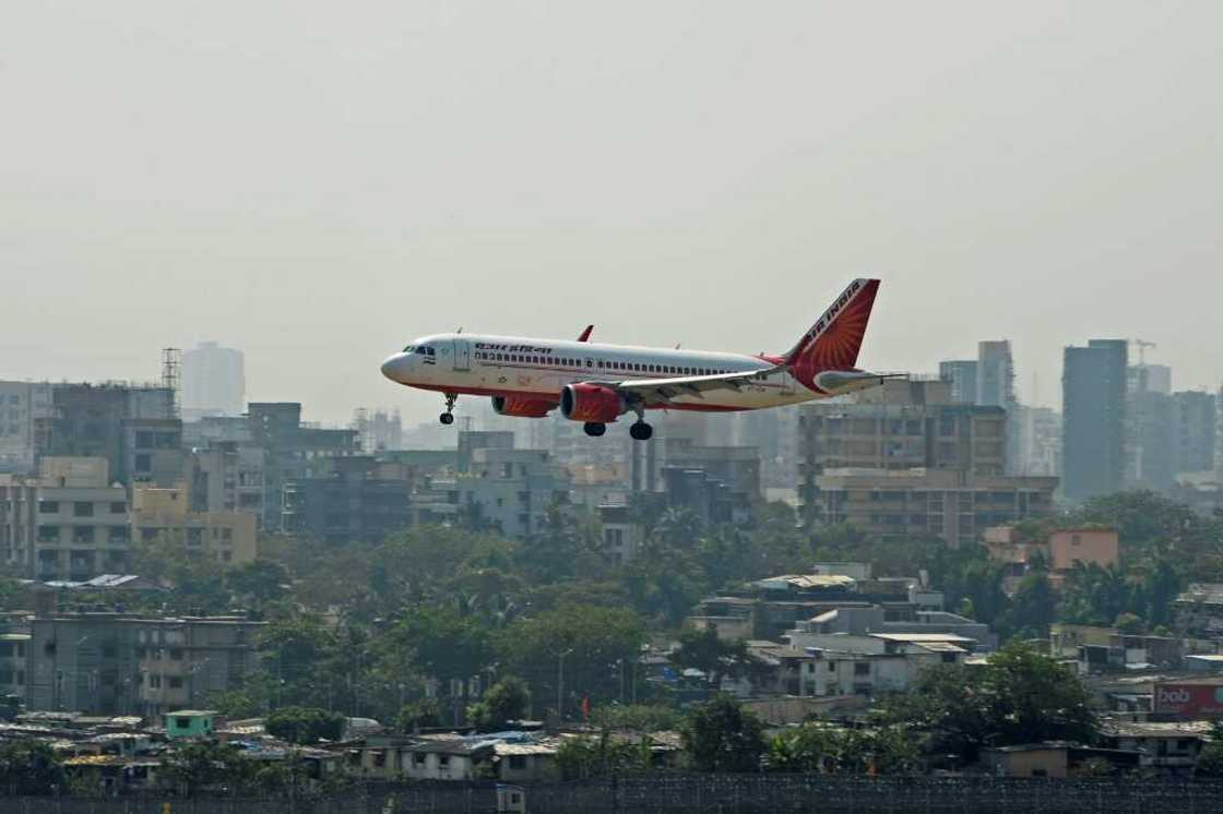 A sacked executive of US banking giant Wells Fargo is accused of urinating on a fellow passenger aboard an Air India flight A sacked executive of US banking giant Wells Fargo is accused of urinating on a fellow passenger aboard an Air India flight
