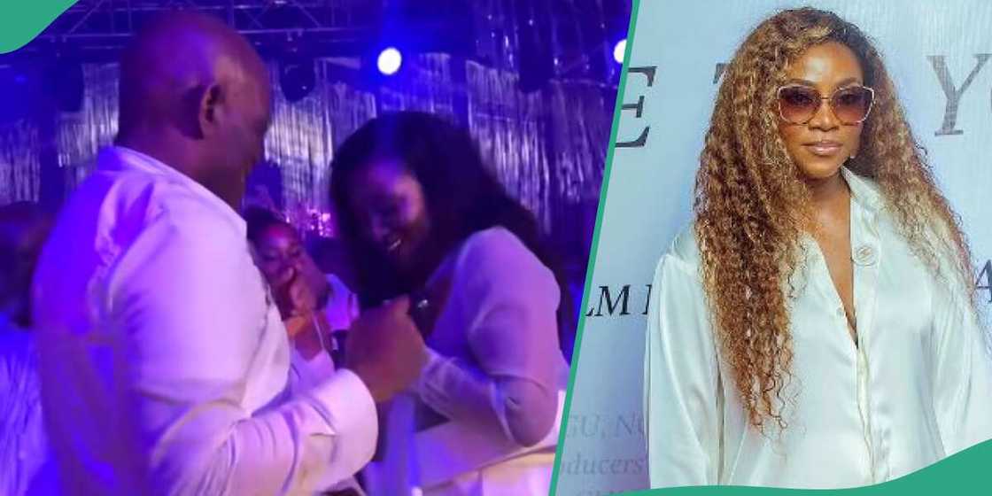 Actress Genevieve Nnaji and Tony Elumelu dancing Actress Genevieve Nnaji and Tony Elumelu dancing