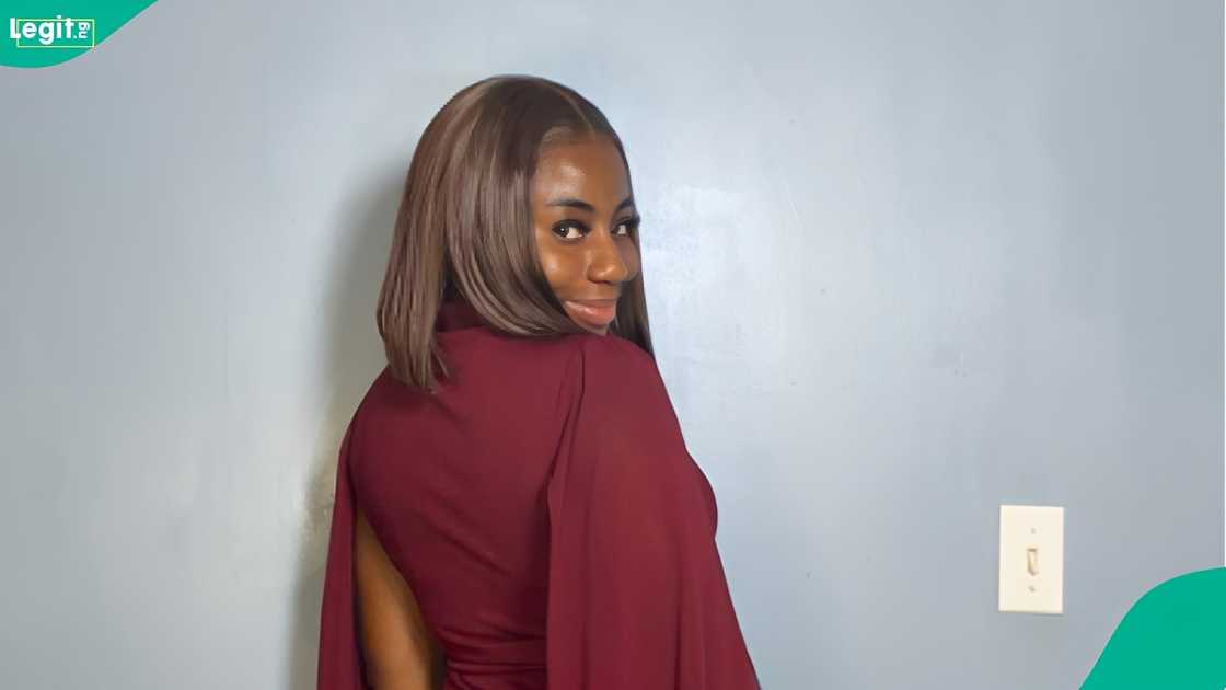 A Nigerian lady celebrates after getting her US green card. A Nigerian lady celebrates after getting her US green card.