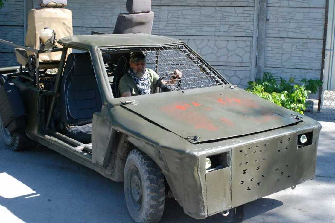 Since the start of the war, Volodymyr Tarkhov says he and his friends have converted around 30 ordinary passenger cars for the military Since the start of the war, Volodymyr Tarkhov says he and his friends have converted around 30 ordinary passenger cars for the military