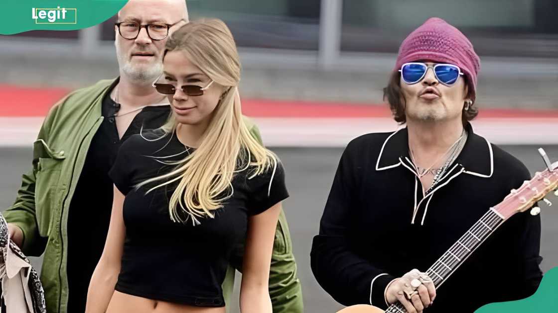 Yulia Vlasova and Johnny seen together attending an event