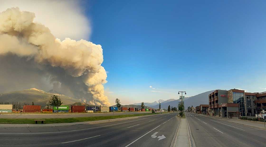 An image obtained from Jasper National Park shows smoke from a wildfire in July 2024 An image obtained from Jasper National Park shows smoke from a wildfire in July 2024