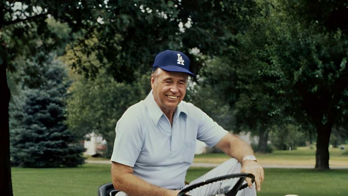 Walter Alston is pictured driving a tractor on the grounds of his home in Darrtown, Ohio.