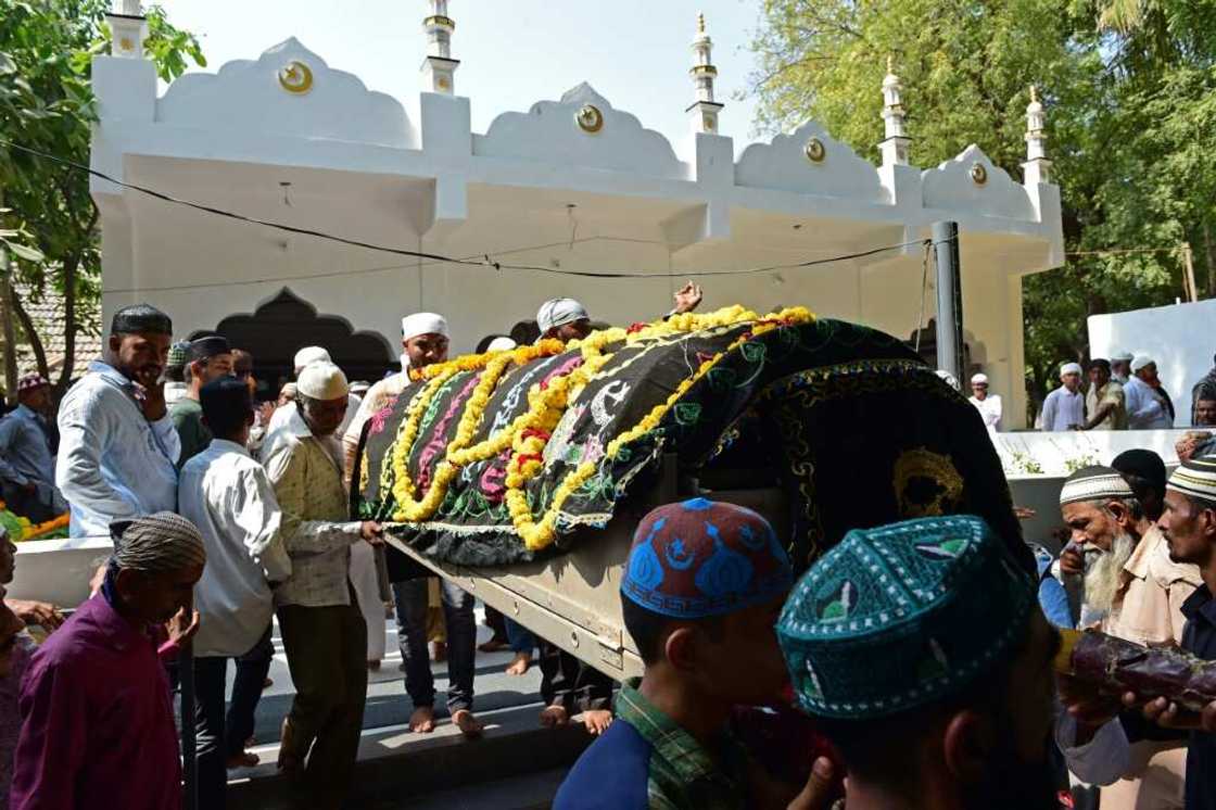 Around 50 Hindu cremations were held on Monday, and 37 Muslim funerals were being carried out at the only Islamic cemetery in the district Around 50 Hindu cremations were held on Monday, and 37 Muslim funerals were being carried out at the only Islamic cemetery in the district