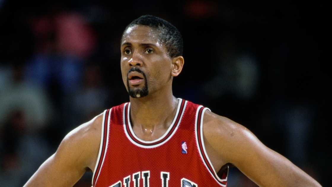 Bill Cartwright of the Chicago Bulls looking on with his hands on hips. Bill Cartwright of the Chicago Bulls looking on with his hands on hips.