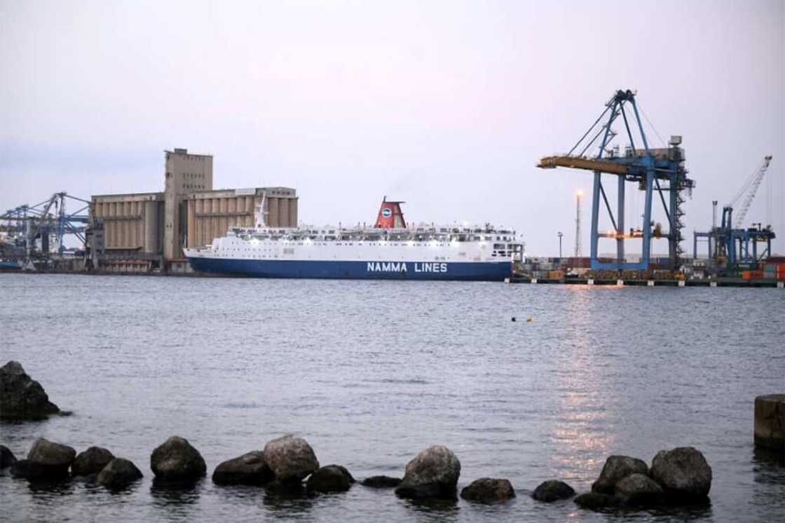 A Saudi-flagged ferry carrying war evacuees, at Port Sudan on April 25, 2023 -- international trade fell 23 percent in 2023, Sudan's port authorities said