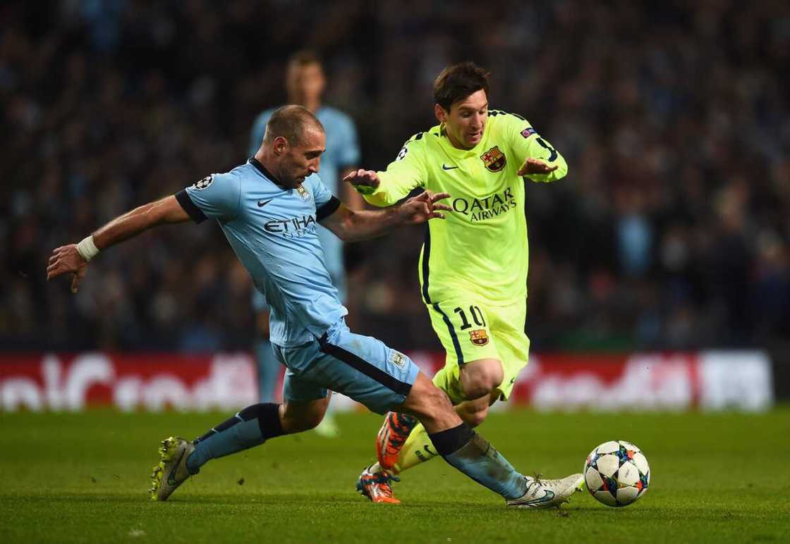 Pablo Zabaleta and Lionel Messi in action. Pablo Zabaleta and Lionel Messi in action.