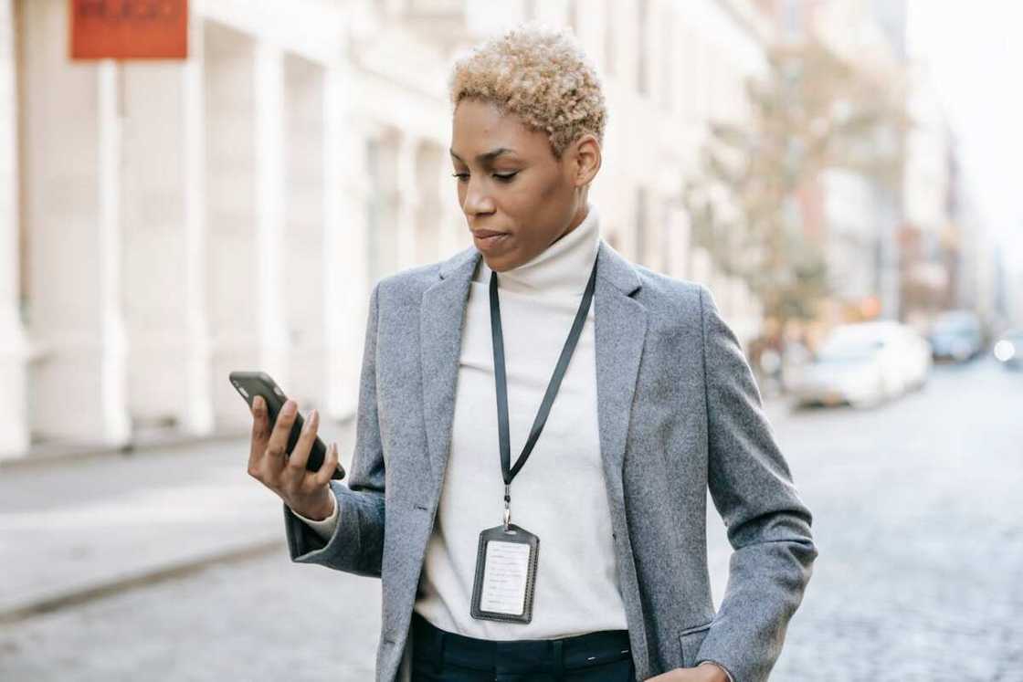 A young lady looking at her phone A young lady looking at her phone