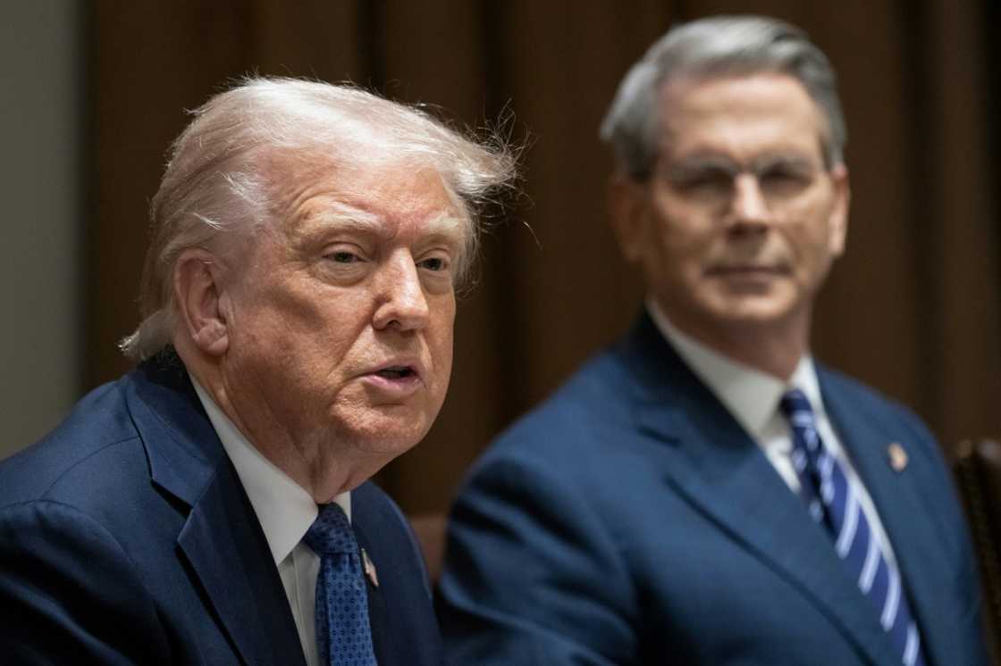 US President Donald Trump maintained that Washington was in talks with Beijing, even as China said such claims were 'groundless' US President Donald Trump maintained that Washington was in talks with Beijing, even as China said such claims were 'groundless'