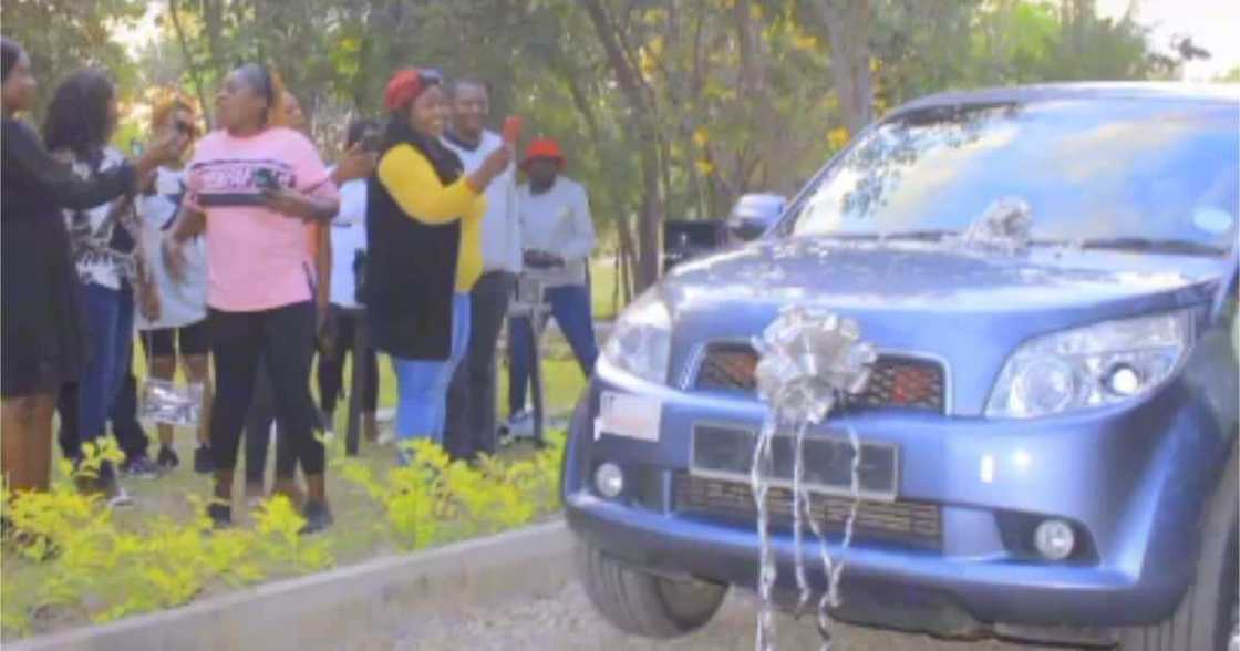 Jeinabor Sor from Zambia, husband gifts wife a car, wife rolls on ground, wife weeps Jeinabor Sor from Zambia, husband gifts wife a car, wife rolls on ground, wife weeps