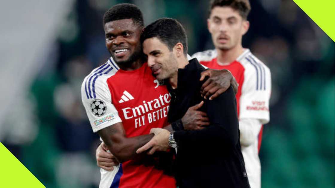 Thomas Partey and Mikel Arteta celebrate Arsenal win.