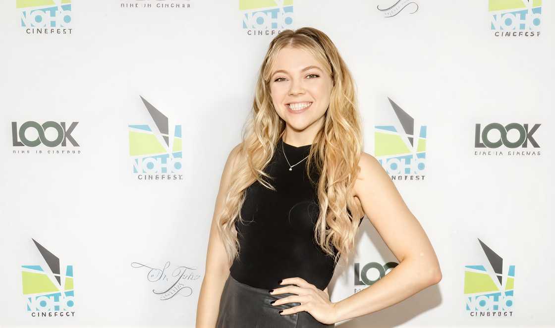 Winter Bassett poses on a red carpet in front of a NoHo CineFest backdrop. Winter Bassett poses on a red carpet in front of a NoHo CineFest backdrop.