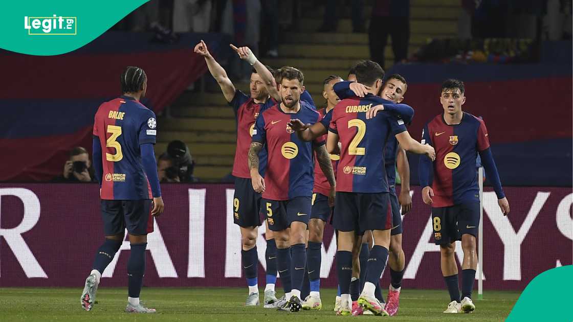 Barcelona players celebrate Robert Lewandowski's goal against Borussia Dortmund. Barcelona players celebrate Robert Lewandowski's goal against Borussia Dortmund.