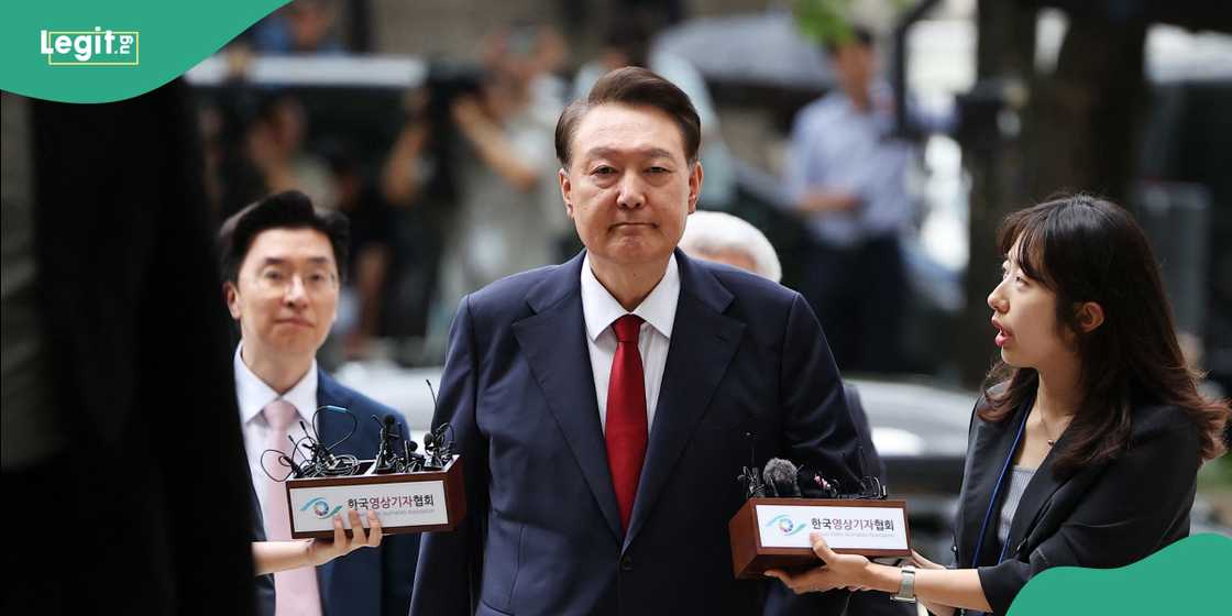 Former president Yoon Suk Yeol appeared expressionless as the court read out his life sentence.