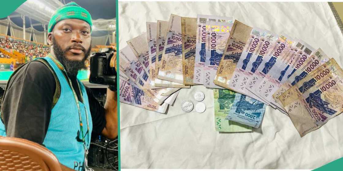 Man in Ivory Coast converts naira to CFA. Man in Ivory Coast converts naira to CFA.
