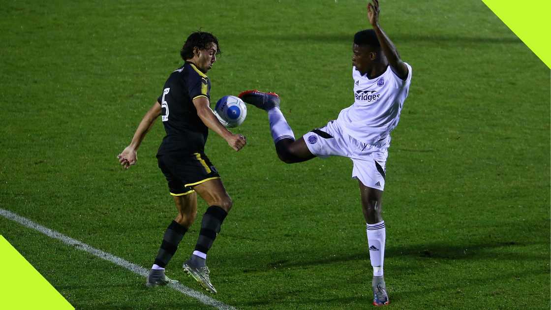 Shaun Okojie playing for Aldershot Town against AFC Wimbledon.