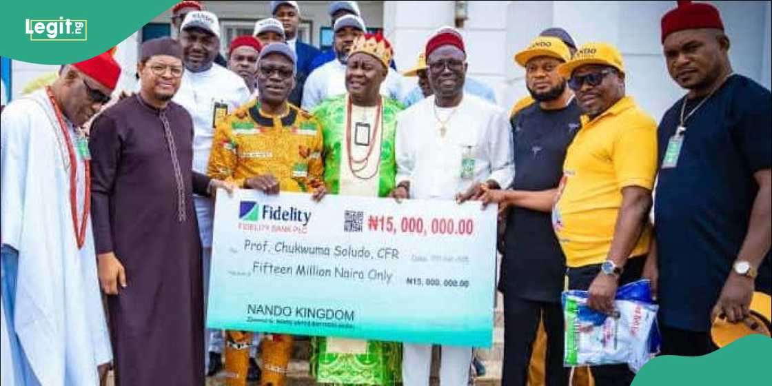 Nando community leaders present branded caps and T-shirts during a courtesy visit to the governor.