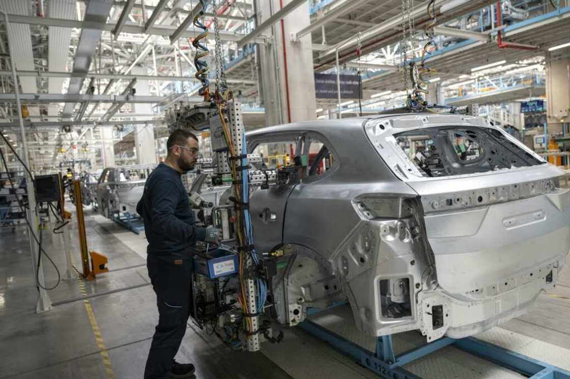 Workers on the assembly line at the Togg electric vehicle plant in western Turkey