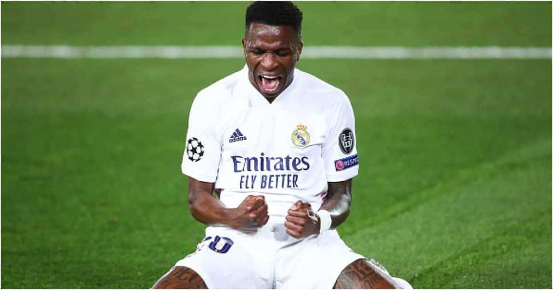 Vinicius Junior celebrates scoring a goal during the UEFA Champions League Quarter Final match against Liverpool FC at Estadio Alfredo Di Stefano on April 06, 2021 in Madrid, Spain. (Photo by Fran Santiago/Getty Images) Vinicius Junior celebrates scoring a goal during the UEFA Champions League Quarter Final match against Liverpool FC at Estadio Alfredo Di Stefano on April 06, 2021 in Madrid, Spain. (Photo by Fran Santiago/Getty Images)