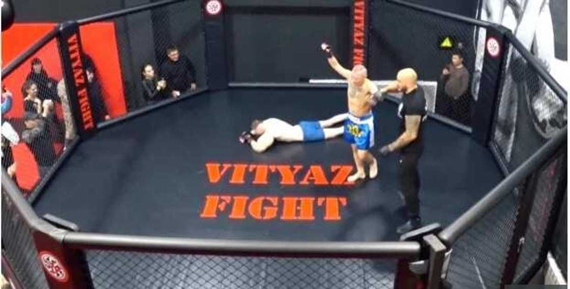 Real-life Popeye: Russian bodybuilder with unusually huge biceps beaten by opponent twice his age in MMA fight Real-life Popeye: Russian bodybuilder with unusually huge biceps beaten by opponent twice his age in MMA fight