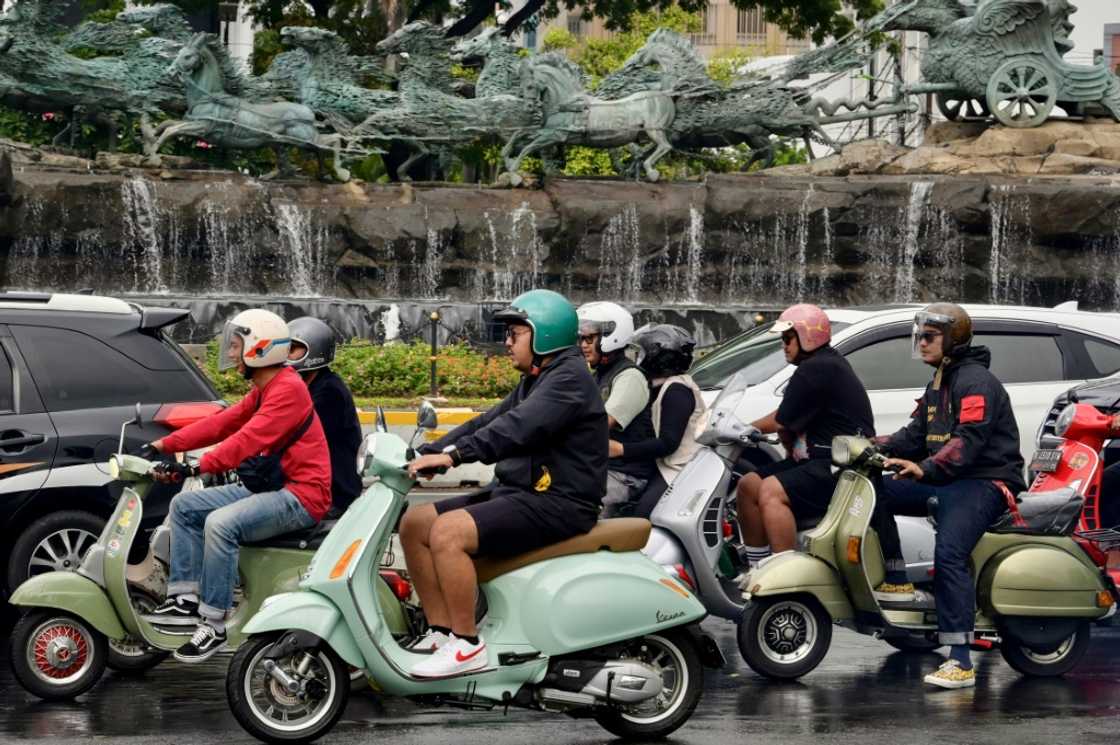 Indonesia has long suffered from air pollution partly driven by its addiction to old cars and scooters Indonesia has long suffered from air pollution partly driven by its addiction to old cars and scooters