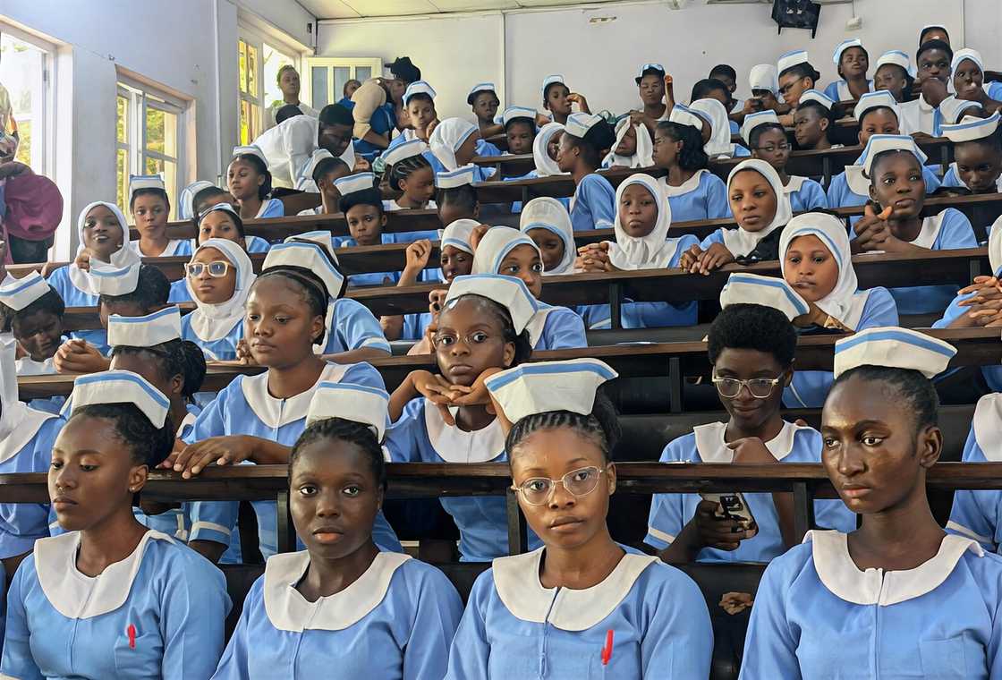 Nursing students gather in a hall setting. Nursing students gather in a hall setting.