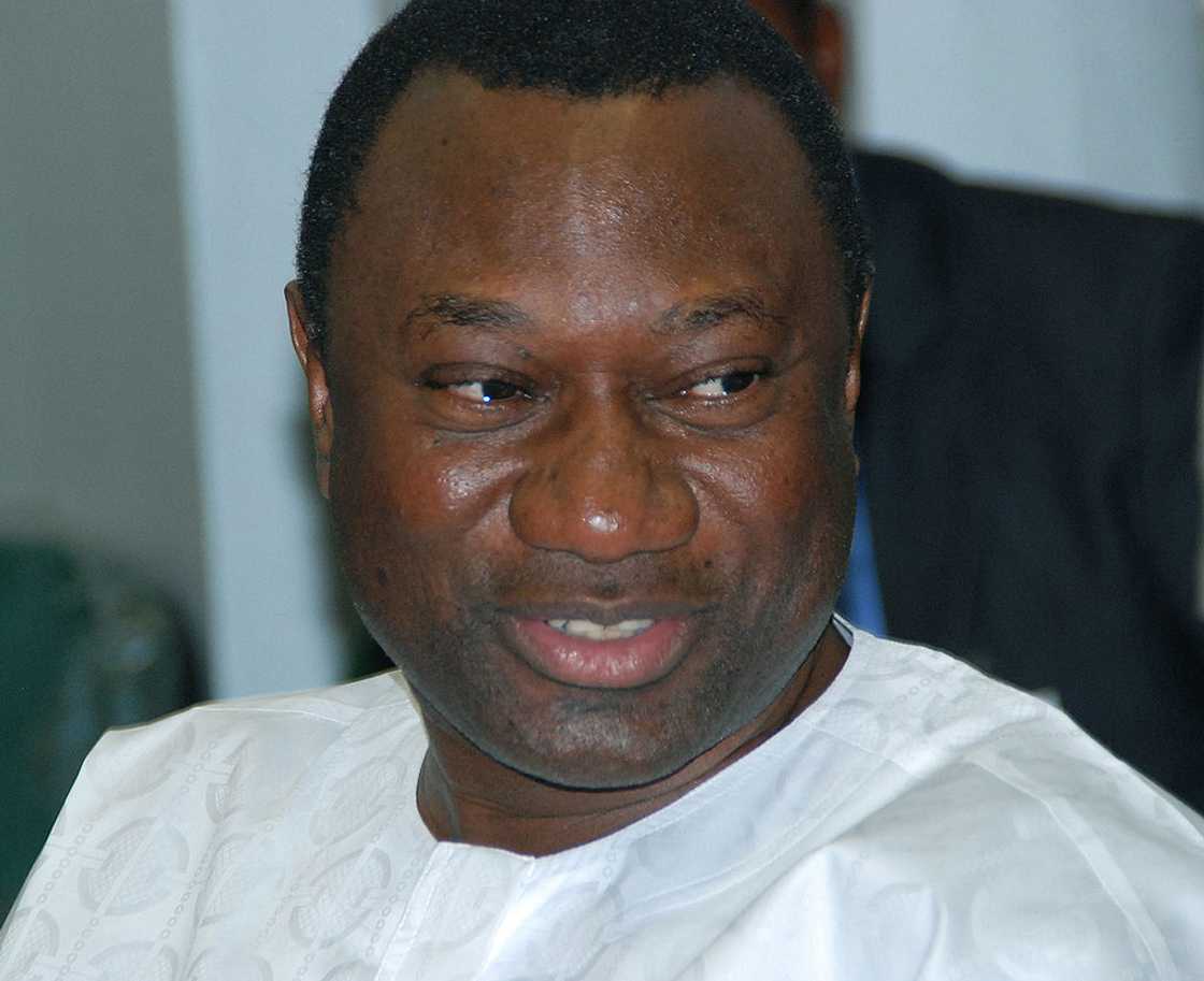 Close-up of Femi Otedola in a white traditional outfit, smiling in Lagos, Nigeria, 2006