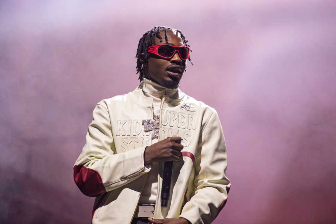 Lil Tjay performs at an event in England