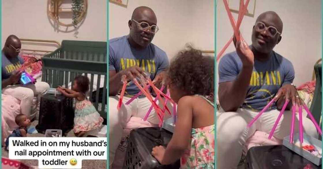 Father stays still as little daughter paints his nails Father stays still as little daughter paints his nails
