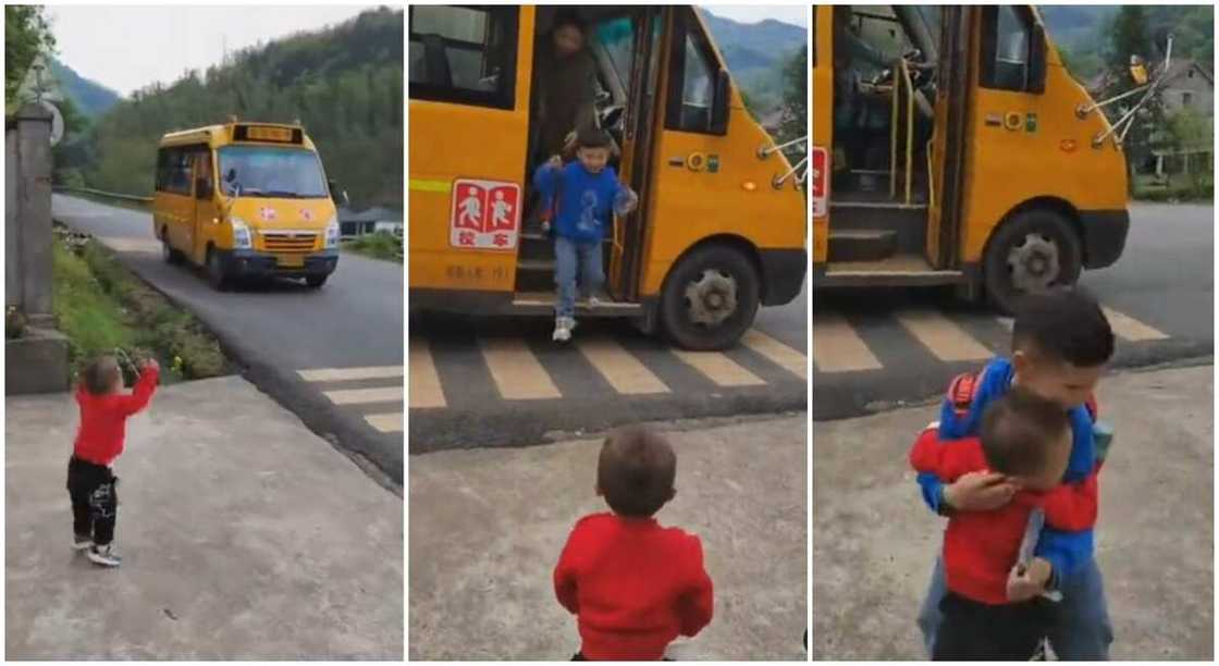 Boy hugging his elder brother tightly as he came back from school.