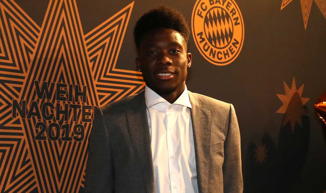 Alphonso Davies of FC Bayern München poses during the club's 2019 Christmas party Alphonso Davies of FC Bayern München poses during the club's 2019 Christmas party