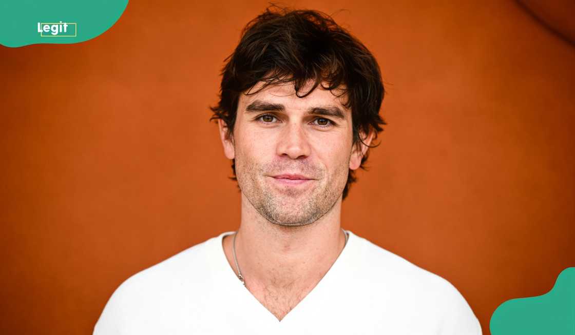K.J. Apa poses on the red carpet at the French Open K.J. Apa poses on the red carpet at the French Open