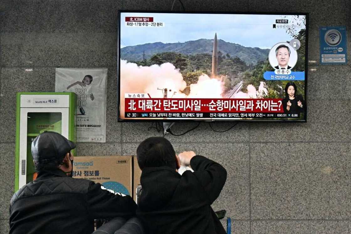 Visitors watch file footage of a North Korean missile test at the ferry terminal of South Korea's Ulleungdo island earlier this month Visitors watch file footage of a North Korean missile test at the ferry terminal of South Korea's Ulleungdo island earlier this month