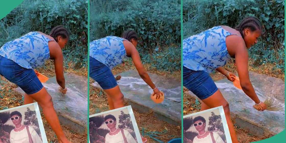 Lady sweeps her mother's grave. Lady sweeps her mother's grave.